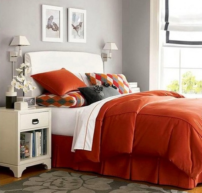 dormitorio matrimonial con acentos naranja